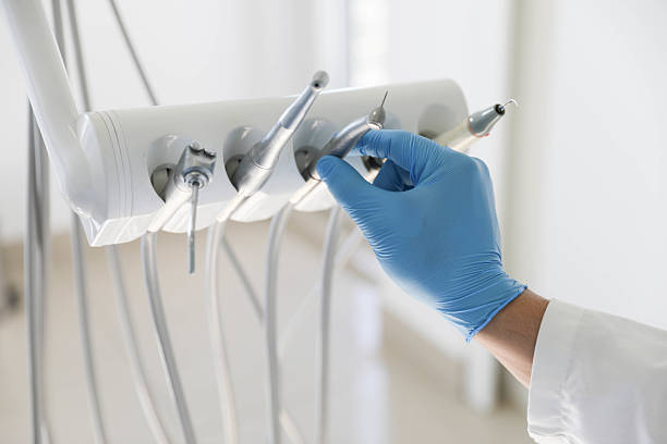 Professional Tooth Extraction technician working in Van Vleck, TX